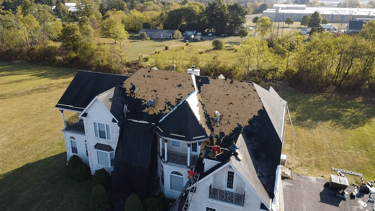 Mansion roof during tear-off phase